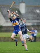 17 January 2013; Sean Ryan, Thurles CBS, in action against Lorcan Lyons, Castletroy College Limerick. Dr. Harty Cup Quarter-Final, Thurles CBS v Castletroy College Limerick, Sean Treacy Park, Tipperary Town, Co. Tipperary. Picture credit: Diarmuid Greene / SPORTSFILE