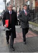 17 January 2013; Munster's Ronan O'Gara, right, accompanied by Munster media manager Pat Geraghty, arrives for an ERC disciplinary hearing following an incident with Edinburgh's Sean Cox during last Sunday's Heineken Cup, Pool 1, Round 5, game in Murrayfield. ERC Offices, Hugenot House, St. Stephen's Greeen, Dublin. Picture credit: Barry Cregg / SPORTSFILE