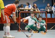 31 January 2013; Team Ireland's goalkeeper Sean Murphy, from Gurranabraher, Cork, and team-mates George Fitzgerald, 4, from Waterford City, and Brendan O'Sullivan, from Mallow, Co. Cork, defend a free against Austria. Division 2, Semi-Final, Austria v Ireland, 2013 Special Olympics World Winter Games, Floorball, Gangneung Indoor Sports Center, Gangneung, South Korea. Picture credit: Ray McManus / SPORTSFILE