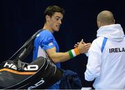 1 February 2013; James McGee, Ireland, celebrates with non playing captain Garry Cahill after victory over Jaan Kononov, Estonia, at the end of their 1st round match. Davis Cup Europe / Africa, 1st Round, Ireland v Estonia, David Lloyd Riverview, Clonskeagh, Dublin. Picture credit: David Maher / SPORTSFILE