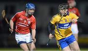 1 February 2013; Nicky O'Connell, Clare, in action against Rob O'Shea, Cork. Waterford Crystal Cup Semi-Final, Clare v Cork, Sixmilebridge, Co. Clare. Picture credit: Diarmuid Greene / SPORTSFILE