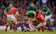 2 February 2013; Dave Kilcoyne, Ireland, is tackled by Lloyd Williams, Wales. RBS Six Nations Rugby Championship, Wales v Ireland, Millennium Stadium, Cardiff, Wales. Picture credit: Stephen McCarthy / SPORTSFILE