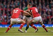 2 February 2013; Cian Healy, Ireland, in action against Jamie Roberts, left, and Toby Faletau, Wales. RBS Six Nations Rugby Championship, Wales v Ireland, Millennium Stadium, Cardiff, Wales. Picture credit: Stephen McCarthy / SPORTSFILE