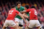 2 February 2013; Ireland's Sean O'Brien, with support from team-mate Mike McCarthy, is tackled by Jamie Roberts, left, and Toby Faletau, Wales. RBS Six Nations Rugby Championship, Wales v Ireland, Millennium Stadium, Cardiff, Wales. Picture credit: Stephen McCarthy / SPORTSFILE