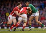 2 February 2013; Simon Zebo, Ireland, is tackled by Craig Mitchell, Wales. RBS Six Nations Rugby Championship, Wales v Ireland, Millennium Stadium, Cardiff, Wales. Picture credit: Stephen McCarthy / SPORTSFILE