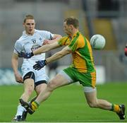 2 February 2013; Daniel Flynn, Kildare, in action against Anthony Thompson, Donegal. Allianz Football League, Division 1, Kildare v Donegal, Croke Park, Dublin. Picture credit: Barry Cregg / SPORTSFILE