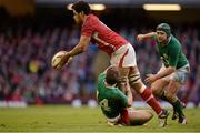 2 February 2013; Toby Faletau, Wales, is tackled by Craig Gilroy, Ireland. RBS Six Nations Rugby Championship, Wales v Ireland, Millennium Stadium, Cardiff, Wales. Picture credit: Brendan Moran / SPORTSFILE