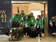 6 February 2013; Special Olympics Team Ireland athletes make their way through the arrivals hall of Dublin Airport having returned home from the 2013 Special Olympics World Winter Games in PyeongChang, South Korea. Dublin Airport, Dublin. Picture credit: Barry Cregg / SPORTSFILE