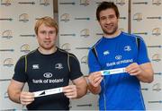 8 February 2013; Leinster players Fionn Carr, left, and Kevin McLaughlin draw out the names of Newbridge College and St. Gerard's School during the Powerade Schools Junior Cup 2nd Round Draw. Leinster Rugby Offices, UCD, Dublin. Photo by Sportsfile