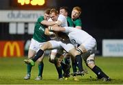 8 February 2013; Alex Day, England, is tackled by Luke McGrath, left, Ryan Murphy, centre, and Conor Joyce, Ireland. U20 Six Nations Rugby Championship, Ireland v England, Dubarry Park, Athlone, Co. Westmeath. Picture credit: Diarmuid Greene / SPORTSFILE