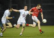 9 February 2013; Damien Cahalane, Cork, in action against Brian Flanagan and John Doyle, Kildare. Allianz Football League, Division 1, Cork v Kildare, Pairc Ui Rinn, Cork. Picture credit: Matt Browne / SPORTSFILE