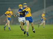 9 February 2013; Seadna Morey, Clare, in action against Shane McGrath, Tipperary. Waterford Crystal Cup Final, Tipperary v Clare, Semple Stadium, Thurles, Co. Tipperary. Picture credit: Barry Cregg / SPORTSFILE