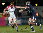 15 February 2013; Ian Henderson, Ulster, is tackled by Marco Bortolami, Zebre. Celtic League 2012/13, Round 15, Ulster v Zebre, Ravenhill Park, Belfast, Co. Antrim. Picture credit: John Dickson / SPORTSFILE