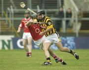 20 April 2003; Tom Kenny, Cork, in action against Kilkenny's Conor Phelan. Allianz National Hurling League, Division 1, Cork v Kilkenny, Pairc Ui Chaoimh, Cork. Picture credit; Damien Eagers / SPORTSFILE *EDI*