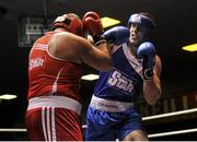 15 February 2013; Dean Gardiner, Clonmel, right, exchanges punches with Sean Turner, Drimnagh, during their 91+kg bout. National Elite Boxing Championships, Semi-Finals, National Stadium, Dublin. Picture credit: Pat Murphy / SPORTSFILE