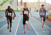 17 February 2013; Keith Pike, centre, Clonliffe Harriers A.C., Dublin, crosses the line ahead of Isreal Ibeanu, left, Clonliffe Harriers A.C and Lorcan O Cathain, right, Roscommon A.C, to win the senior men's 60m event. Woodie’s DIY AAI Senior Indoor Championships, Athlone Institute of Technology International Arena, Athlone, Co. Westmeath. Picture credit: Tomas Greally / SPORTSFILE
