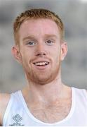 17 February 2013; John Travers, Donore Harriers A.C., after winning the men's 3000m event. Woodie’s DIY AAI Senior Indoor Championships, Athlone Institute of Technology International Arena, Athlone, Co. Westmeath. Picture credit: Stephen McCarthy / SPORTSFILE