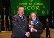 23 February 2013; Uachtarán Chumann Lúthchleas Gael Liam Ó Néill with Eimear Quinn, captain of the victorious  Drumhowan Geraldines, Co Monaghan, team after they won the 'Instrumental Music' competition during the All-Ireland Scór na nÓg Championship Finals 2013. The Venue, Limavady Road, Derry. Picture credit: Ray McManus / SPORTSFILE