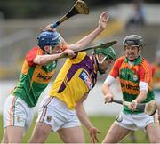 24 February 2013; Stephen Murphy, Wexford, in action against John Corcoran, left, and Edward Coady, Carlow. Allianz Hurling League, Division 1B, Carlow v Wexford, Dr. Cullen Park, Carlow. Picture credit: David Maher / SPORTSFILE