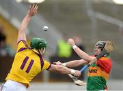 24 February 2013; Stephen Murphy, Wexford, in action against Richard Coady, Carlow. Allianz Hurling League, Division 1B, Carlow v Wexford, Dr. Cullen Park, Carlow. Picture credit: David Maher / SPORTSFILE