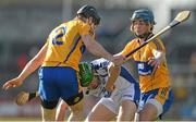 24 February 2013; Brian O'Sullivan, Waterford, in action against Domhnall O'Donovan, left, and Patrick O'Connor, Clare. Allianz Hurling League, Division 1A, Clare v Waterford, Cusack Park, Ennis, Co. Clare. Picture credit: Diarmuid Greene / SPORTSFILE