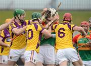 24 February 2013; Players from both sides confront each other. Allianz Hurling League, Division 1B, Carlow v Wexford, Dr. Cullen Park, Carlow. Picture credit: David Maher / SPORTSFILE