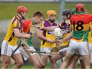 24 February 2013; Players from both sides confront each other. Allianz Hurling League, Division 1B, Carlow v Wexford, Dr. Cullen Park, Carlow. Picture credit: David Maher / SPORTSFILE