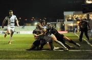 1 March 2013; Sean Cronin, Leinster, goes over for his side's first try, despite the tackle of Adam Hughes, left, and Steffan Jones, Dragons. Celtic League 2012/13, Round 17, Dragons v Leinster. Rodney Parade, Newport, Wales. Picture credit: Stephen McCarthy / SPORTSFILE