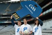 4 March 2013; Cork footballer Aidan Walsh with Michael Byrne and Emily O'Reilly, from Coláiste Bhríde Carnew, Co. Wicklow, at the launch of the GAA Tackling Bullying campaign. GAA Tackling Bullying, Croke Park, Dublin. Photo by Sportsfile