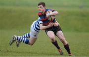 5 March 2013; Gary Bateman, St Munchin's, is tackled by Adam Horgan, Rockwell College. Munster Schools Senior Cup Semi-Final, Rockwell College v St Munchin's College, Clanwilliam RFC, Clanwilliam Park, Tipperary Town, Tipperary. Picture credit: Diarmuid Greene / SPORTSFILE