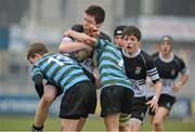 6 March 2013; Timmy Murphy, Newbridge College, is tackled by Daniel Hodgins, left, and Sam Kenny, right, St. Gerard’s School. Powerade Leinster Schools Junior Cup, Quarter-Final Replay, St. Gerard’s School v Newbridge College, Donnybrook Stadium, Donnybrook, Dublin. Picture credit: Barry Cregg / SPORTSFILE