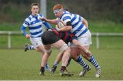 5 March 2013; James Maxwell, Rockwell, is tackled by Lee Nicholas, St Munchin's. Munster Schools Senior Cup Semi-Final, Rockwell College v St Munchin's College, Clanwilliam RFC, Clanwilliam Park, Tipperary Town, Tipperary. Picture credit: Diarmuid Greene / SPORTSFILE