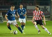 8 March 2013; Ruaidhri Higgins, Derry City, in action against David Cawley, Sligo Rovers. Airtricity League Premier Division, Derry City v Sligo Rovers, The Brandywell, Derry. Picture credit: Oliver McVeigh / SPORTSFILE