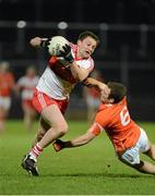 9 March 2013; James Kielt, Derry, in action against Brendan Donaghy, Armagh. Allianz Football League, Division 2, Derry v Armagh, Celtic Park, Derry. Picture credit: Oliver McVeigh / SPORTSFILE