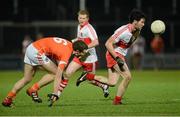 9 March 2013; Daniel Haveron, Derry, in action against Brendan Donaghy, Armagh. Allianz Football League, Division 2, Derry v Armagh, Celtic Park, Derry. Picture credit: Oliver McVeigh / SPORTSFILE