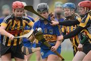 10 March 2013; Clare Kennedy, Tipperary, in action against Kilkenny players, from left, Aisling Dempsey, Mairead Power and Grace Walsh. Irish Daily Star National Camogie League, Division 1, Group 1, Tipperary v Kilkenny, Semple Stadium, Thurles, Co. Tipperary. Picture credit: David Maher / SPORTSFILE