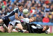 10 March 2013; Tomás O'Connor, Kildare, in action against Rory O'Carroll, left, and Shane Supple, Dublin. Allianz Football League, Division 1, Kildare v Dublin, Croke Park, Dublin. Picture credit: Dáire Brennan / SPORTSFILE