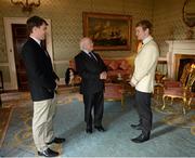 11 March 2013; President of Ireland Michael D. Higgins with University College Dublin Boat Club captain Eamonn Lannoye, left, and Dublin University Boat Club captain Myles McCormack during the coin toss to determine the outcome for the Gannon Cup race. The annual Irish Universities Boat Race will take place on the River Liffey on the 16th of March. Racing commences at 12:45pm at O'Connell Bridge. For more details see gannoncup.com. Aras an Uachtarain, Phoenix Park, Dublin. Picture credit: Ray McManus / SPORTSFILE