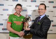 17 March 2013; Karol Mannion, St Brigid's, is presented with the man of the match award by Tom Kinsella, Group Marketing Director, AIB. AIB GAA Football All-Ireland Senior Club Championship Final, Ballymun Kickhams, Dublin v St Brigid's, Roscommon. Croke Park, Dublin. Picture credit: Brian Lawless / SPORTSFILE