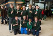 18 March 2013; Members of the Irish Judo squad who returned from an International Tournament in Owicz, Poland, winning 3 Gold and 6 Bronze medals, back, from left, Kevin Lawless, Tuam, Co. Galway, Roisin Cunningham Smyth, Galway, Ciara Cahill, Ennis, Co. Clare, Aaron Mannion Edwards, Galway, and Ciaran Weldon, Galway, with, front, from left, Stephen Flaherty Kelly, Galway, Roman Romanchuk, Dublin, Simon Maksimchyk, Dublin, Olivia Walsh, Galway. Terminal 2, Dublin Airport, Dublin. Picture credit: Brendan Moran / SPORTSFILE