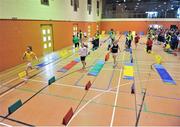 20 March 2013; A general view of the 5th and 6th class girls competing in the 6 lap paarlauf race at the Sportshall Athletics Finals. John McCormack Hall, Athlone IT, Co. Westmeath. Picture credit: Barry Cregg / SPORTSFILE