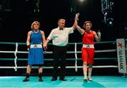 22 March 2013; Katie Taylor, Ireland, right, is declared the winner over Yulia Tsiplakova, Ukraine, after their bout. Katie Taylor Fight Night, Bord Gais Energy Theatre, Grand Canal Square, Docklands, Dublin. Picture credit: Matt Browne / SPORTSFILE