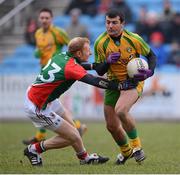 24 March 2013; Frank McGlynn, Donegal, is tackled by Richie Feeney, Mayo. Allianz Football League, Division 1, Mayo v Donegal, Elverys MacHale Park, Castlebar, Co. Mayo. Picture credit: Stephen McCarthy / SPORTSFILE