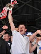 6 April 2013; Dungarvan Colleges captain Tom Devine lifts the cup after victory over Kilkenny CBS. Masita All-Ireland Colleges Senior Hurling 'A' Championship Final, Dungarvan Colleges v Kilkenny CBS, Semple Stadium, Thurles, Co. Tipperary. Picture credit: Diarmuid Greene / SPORTSFILE