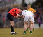 7 April 2013; Referee Padraig O'Sullivan notes the name of  Fermanagh's Thomas Corrigan before issuing him with a yellow card. Allianz Football League, Division 3, Meath v Fermanagh, Pairc Tailteann, Navan, Co. Meath. Picture credit: Ray McManus / SPORTSFILE