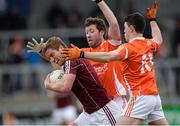 7 April 2013; Gary O'Donnell, Galway, in action against Sean Clarke and Caolan Rafferty, right, Armagh. Allianz Football League, Division 2, Armagh v Galway, Athletic Grounds, Armagh. Photo by Sportsfile