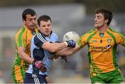 7 April 2013; Kevin McManamon, Dublin, in action against Frank McGlynn and Leo McLoone, Donegal. Allianz Football League, Division 1, Donegal v Dublin, Páirc MacCumhaill, Ballybofey, Co. Donegal. Picture credit: Oliver McVeigh / SPORTSFILE