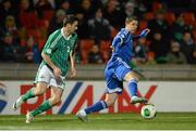 26 March 2013; Maor Melikson, Israel, in action against Daniel Lafferty, Northern Ireland. 2014 FIFA World Cup Qualifier, Group F, Northern Ireland v Israel, Windsor Park, Belfast, Co. Antrim. Picture credit: Oliver McVeigh / SPORTSFILE