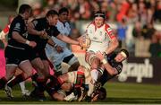 12 April 2013; Iain Henderson, Ulster, is tackled by Andrew Coombs, Dragons. Celtic League 2012/13, Round 20, Ulster v Dragons, Ravenhill Park, Belfast, Co. Antrim. Picture credit: Oliver McVeigh / SPORTSFILE