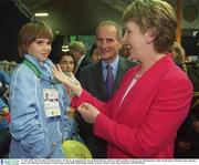 27 June 2003; The President of Ireland Mary McAleese, accompanied by her husband Martin, admires a Silver medal won by 11 year old Romanian Table Tennis player Mariana Tepes during a visit to the 2003 Special Olympics World Games at the RDS, Ballsbridge, Dublin, Ireland. Picture credit; Ray McManus / SPORTSFILE